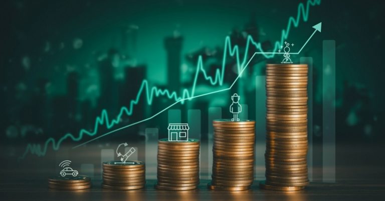 Illustration of growing stacks of coins with an upward-trending financial chart, symbolizing the growth and potential of small cap stocks.